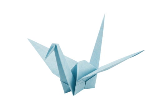 Light blue origami crane isolated on transparent background, traditional Japanese art for peace and mindfulness