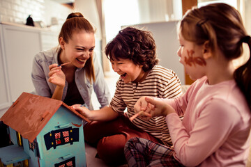 Family fun with dollhouse painting