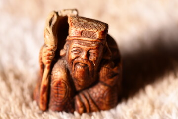 A figurine of a man wearing a hat, perfect for illustrations or decorative purposes