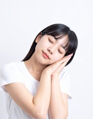 Fototapeta premium 日本人,女性,10代,眠そう,シンプルな白い背景,Simple white background,Japanese,Female,Teens,Sleepy