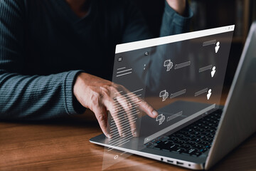 person interacts with a laptop display a transparent holographic interface featuring icons of chatbots,user,and text messages,representing AI communication,digital chat systems,and virtual assistance.