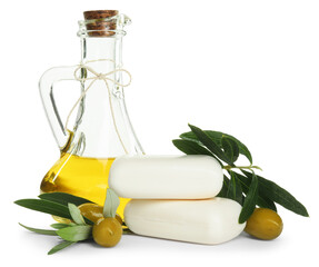 Natural soap bars, olives, oil and green leaves isolated on white