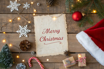 Merry Christmas greeting on parchment with festive decorations and lights paper isolated on a transparent background