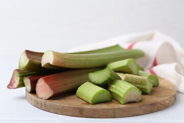 Fresh ripe rhubarb on white table, closeup