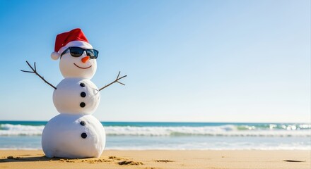cheerful snowman wearing sunglasses and santa hat on a sunny beach during christmas holiday