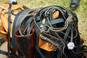 Lots of leather belts or horse harnesses