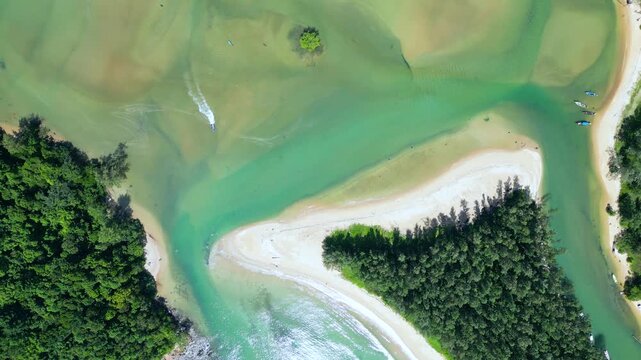 Aerial top down view on the north tip of Layan and Bang Tao Beach in Phuket, Thailand.

