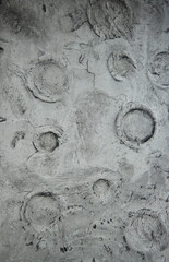 The texture of the lunar crater, plaster on the wall