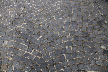 Fototapeta premium background on the background of a cobblestone road