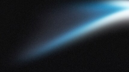 Abstract light beam with soft gradient effect, illuminating dark background, creating a sense of...