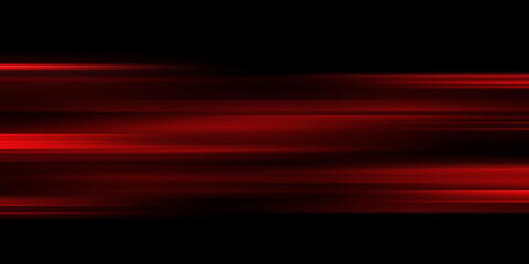 Fototapeta na wymiar The effect of red light in fast motion on a black background. blurred abstract background with long exposure. neon light 