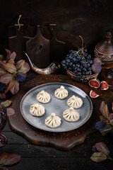 Khinkali – Traditional Georgian Dumplings. Traditional Georgian Bread. Traditional Georgian cuisine styled with authentic atmosphere.