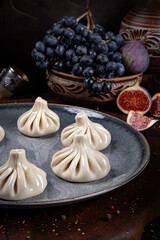 Khinkali – Traditional Georgian Dumplings. Traditional Georgian Bread. Traditional Georgian cuisine styled with authentic atmosphere.