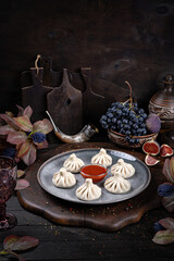 Khinkali – Traditional Georgian Dumplings. Traditional Georgian Bread. Traditional Georgian cuisine styled with authentic atmosphere.