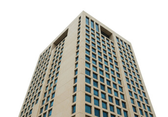 Obraz premium Modern beige building isolated against clear sky, architectural design with geometric windows and clean lines for urban development projects