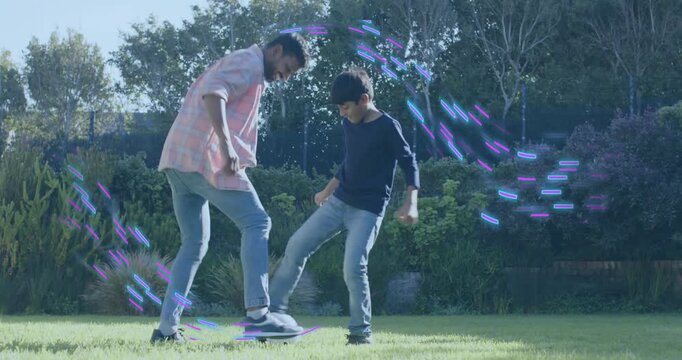 Father tapping black-and-white ball guiding son through soccer education ending in interception