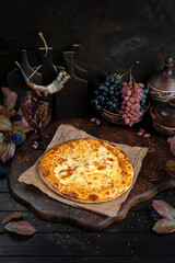 Cheese Khachapuri – Classic Georgian Bread. Traditional Georgian Bread. Traditional Georgian cuisine styled with authentic atmosphere.