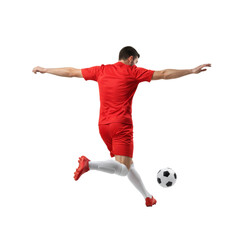 Fototapeta premium Dynamic football action shot of a male player executing a powerful kick with determination