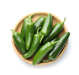 Green jalapeno peppers in bowl isolated on white, top view
