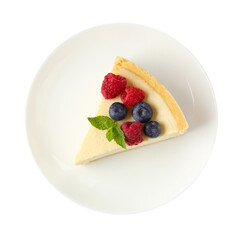 Piece of delicious cheesecake with fresh berries and mint isolated on white, top view