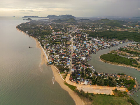 Aerial view of the tranquil coastline where the river meets the sea, painting a serene landscape under the vast sky., Sam Roi Yot, Prachuap Khiri Khan, Thailand.
