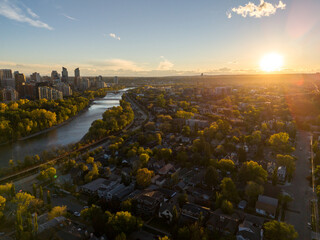 Aerial photograph of Calgary's downtown along the Bow River on a beautiful autumn evening.