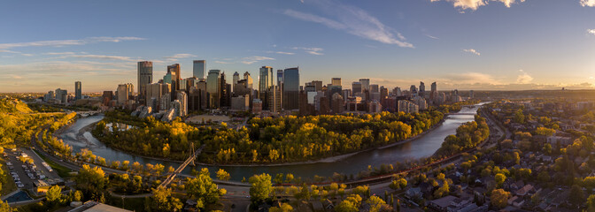 Aerial photograph of Calgary's downtown along the Bow River on a beautiful autumn evening.