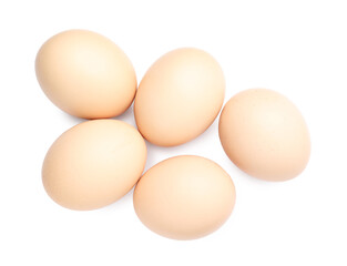 Many raw chicken eggs isolated on white, top view