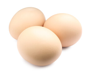 Three raw chicken eggs isolated on white