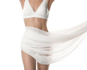 Fototapeta premium Woman covering her slim body with silk fabric on white background, closeup