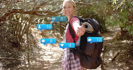 Female hiker walking boardwalk glancing camera and sparking social media icons boosting engagement - Powered by Adobe