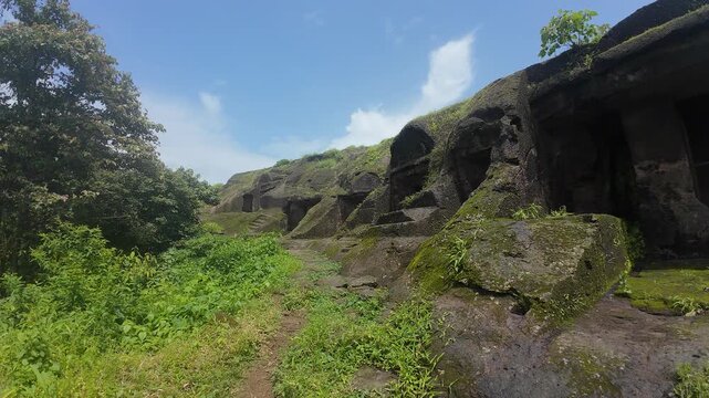  A Buddhist cave from the Kanheri Caves complex in Mumbai, highlighting detailed carvings and serene atmosphere