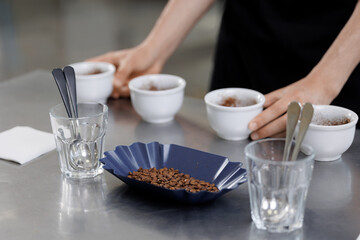 Coffee production process, tasting and evaluating coffee beans in factory setting