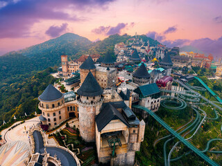 Scenic view of ba na hills fantasy theme park at sunset in Da nang, Vietnam. Landmark for travel tourist in Asia © Parilov