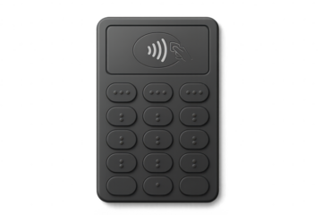 Dark grey contactless payment terminal isolated on transparent background with keypad
