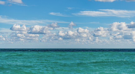 Sunset seascape at summer vacation. Horizon with sea cloudy sky. Calm horizon at sea. Romantic summer vacation seascape. Seascape horizon paradise. Sea sunrise on ocean beach. Distant horizon