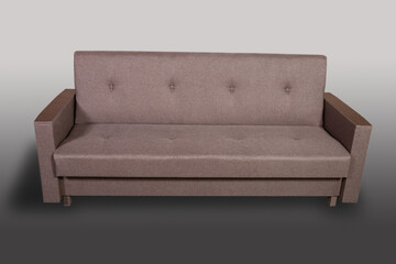 Isolated sofa bed with fabric upholstery on grey gradient background.