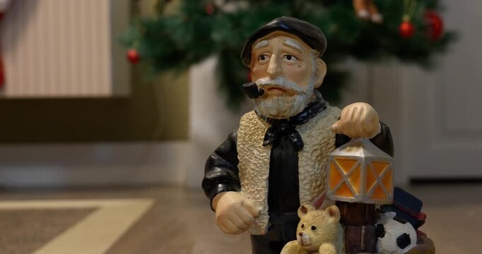 Close-up of the Christmas figure &lsquo;Olentzero&rsquo;. In front of the Christmas tree.