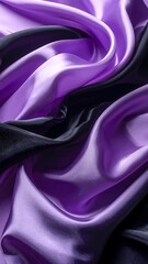 Obraz premium Close-up of draped purple and black silk fabric