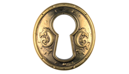 Close-up of an antique brass keyhole escutcheon with ornate design