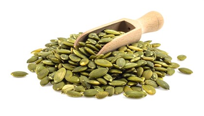 A close-up view showcases a pile of green pumpkin seeds, held in a wooden scoop, against a bright white background
