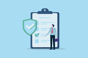 Businessman reviewing a checklist with a shield icon indicating security and protection