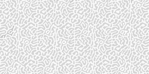 Abstract organic pattern with flowing shapes and irregular textures in light gray and white tones