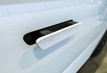 Retractable handle on a car door