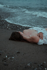 Woman by the sea very emotional