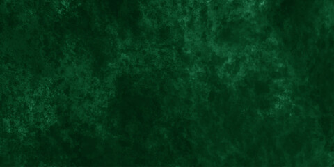 Abstract Elegant dark green background with mottled vintage texture in old fancy background design, texture of colored parchment paper.