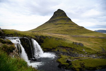 waterfalls by the Kirkjufell mountain in iceland