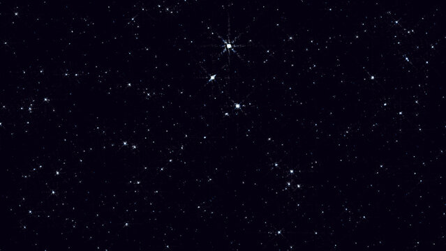 Night starry skies with twinkling and blinking stars. Abstract dark glowing stars or particles. Space science background of black sky in starry night.