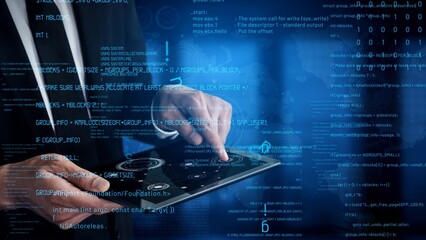 A business professional engages with a tablet device, surrounded by a digital interface showcasing data and coding, highlighting modern technology and connectivity. Xenic
