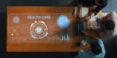 A dynamic health care technology scene featuring a collaborative team analyzing an innovative interactive dashboard filled with data and visual analytics in a modern workspace. Trope